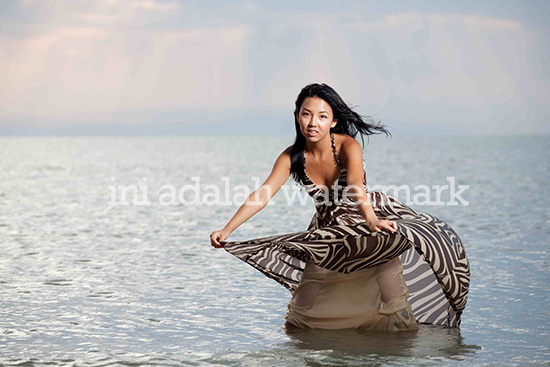 beautiful asian woman sea ocean dress